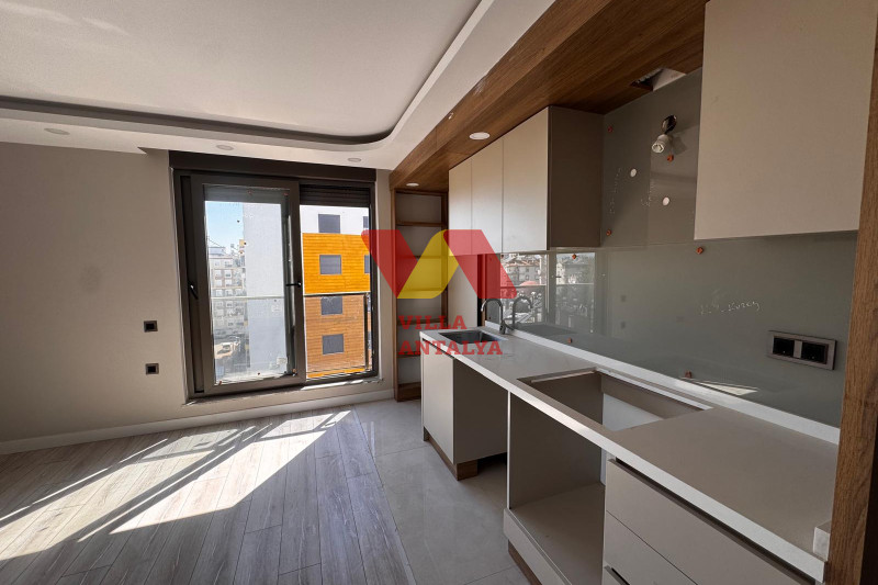 Новая квартира 2+1 в центре Анталии. Фото 1